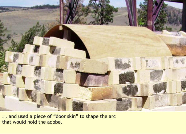 . . and used a piece of “door skin” to shape the arc that would hold the adobe.