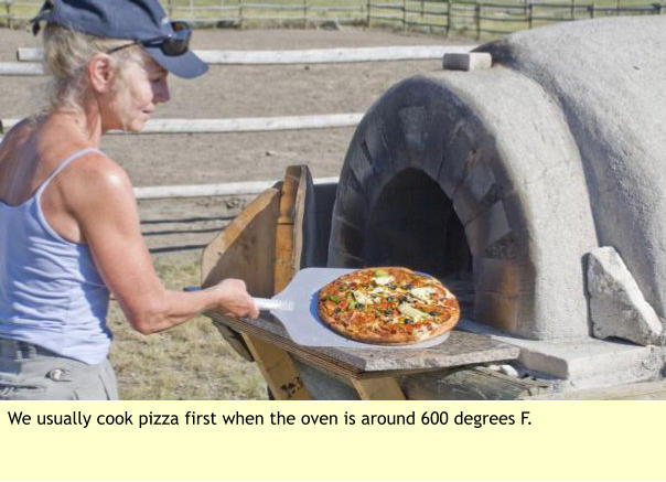 We usually cook pizza first when the oven is around 600 degrees F.